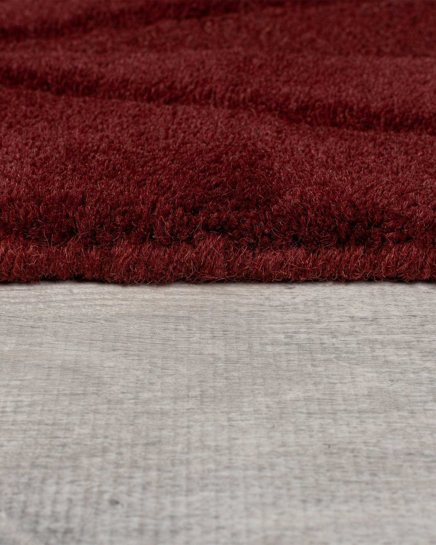 Tappeto geometrico in lana Shard, rosso