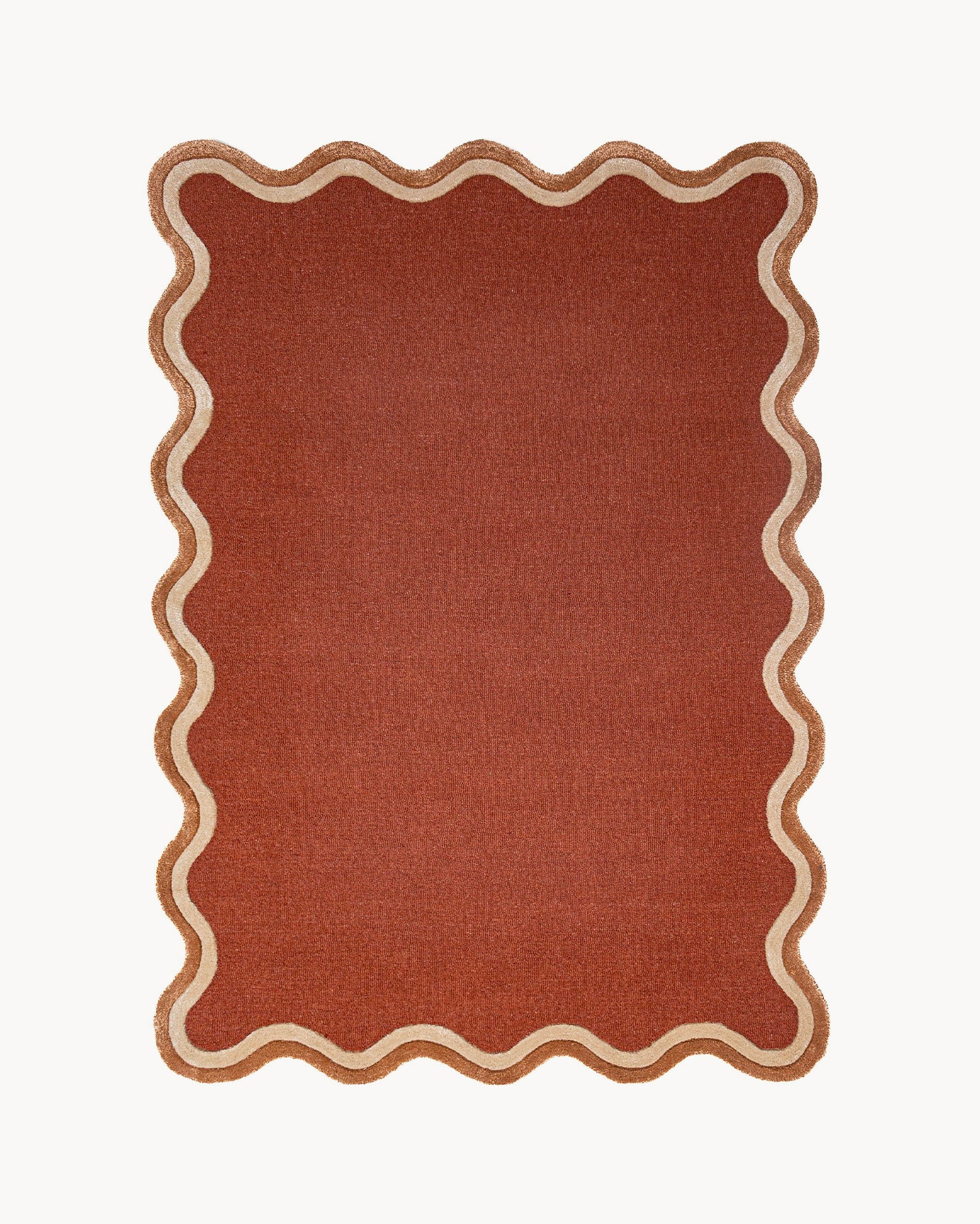 Tappeto in lana con bordo smerlato Rivo