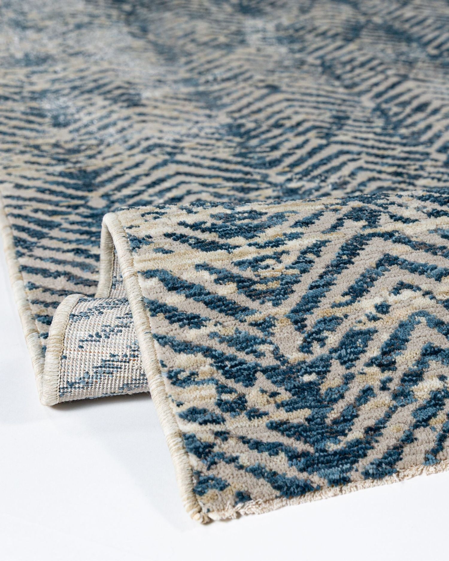 Tappeto astratto a chevron Lua