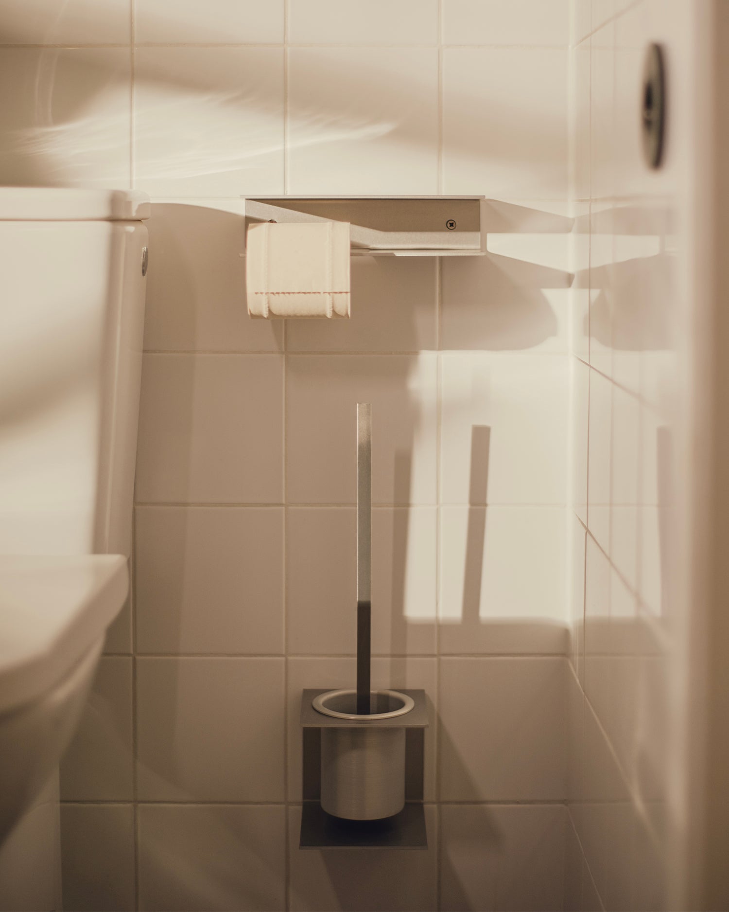 Portarotolo carta igienica in alluminio Raww