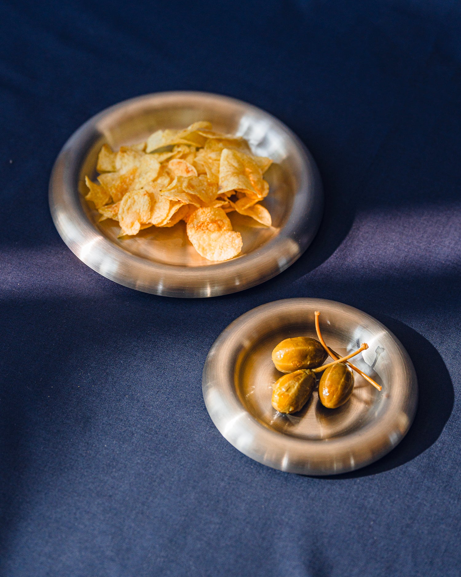 Set 2 piatti in acciaio Roto