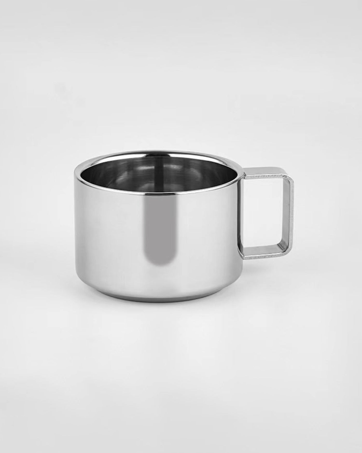 Set 2 tazze da caffè in acciaio con piatto e cucchiaino Luce