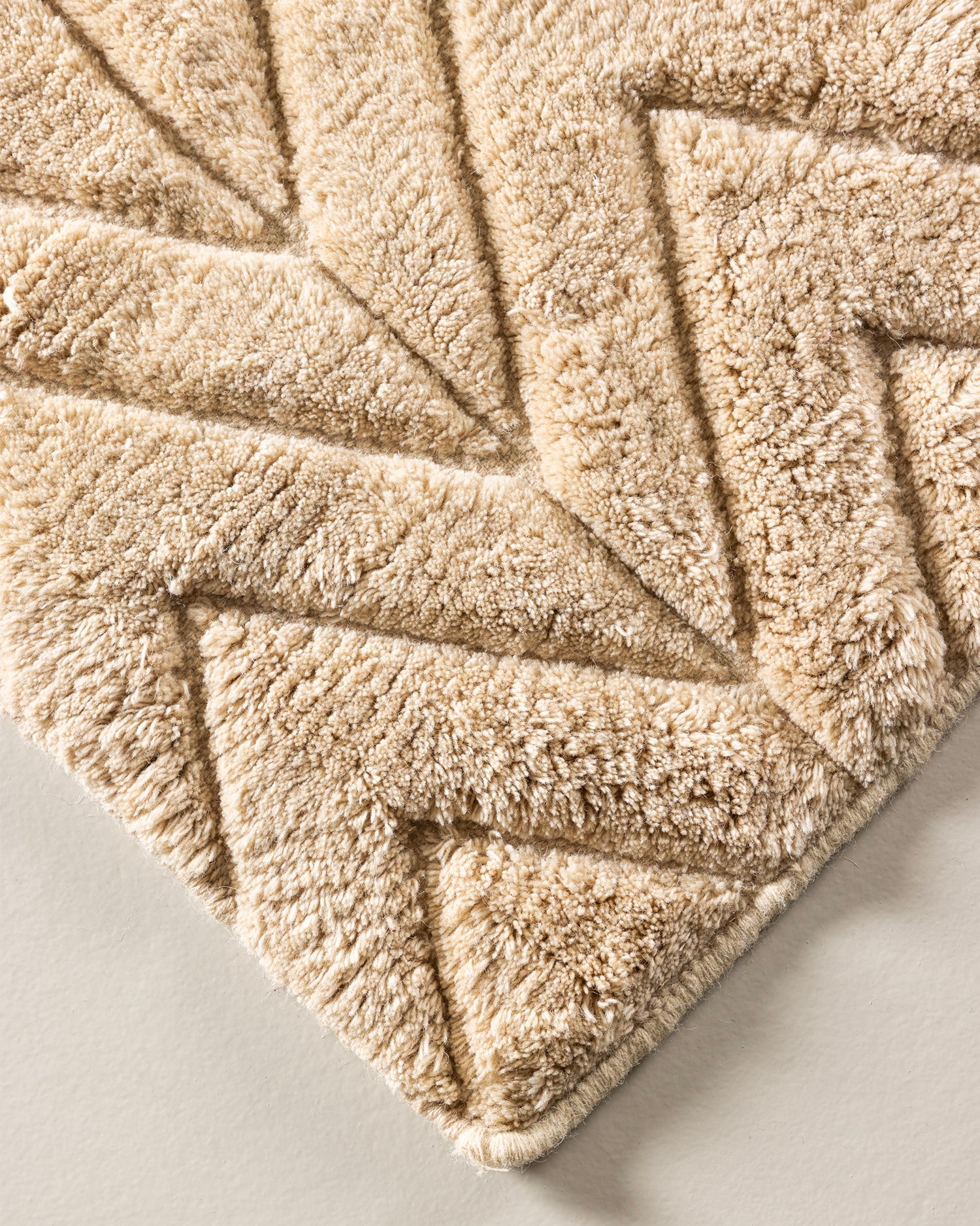 Tappeto in lana con motivo intrecciato Zoe