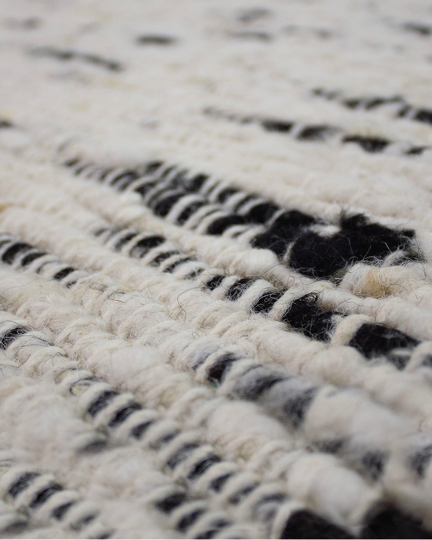 Tappeto in lana con frange Ellsa