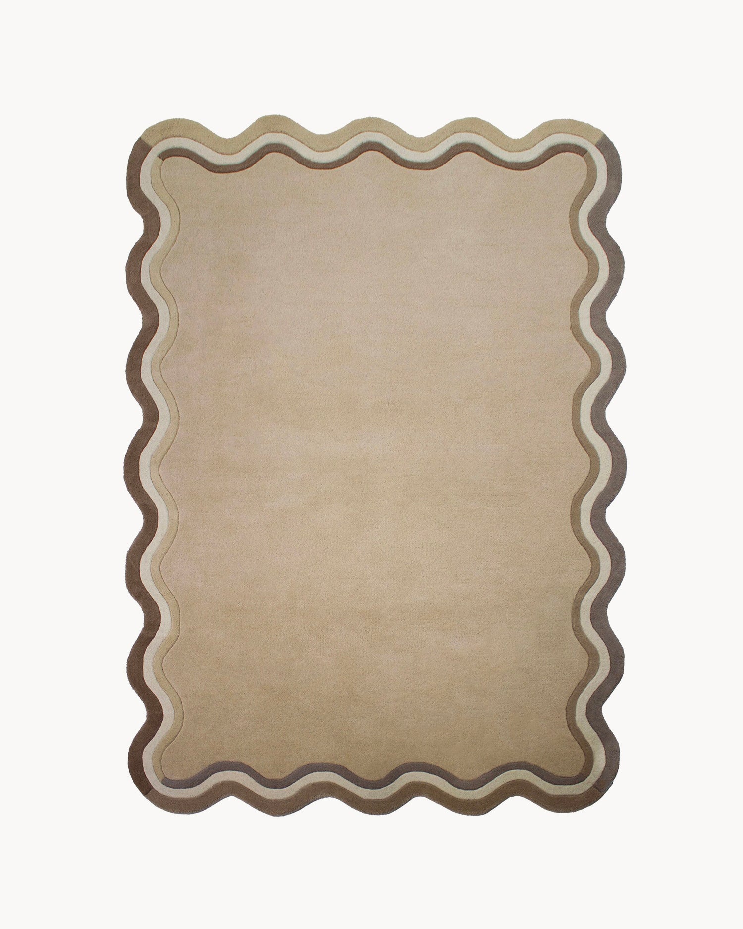 Tappeto in lana con bordo smerlato Leo