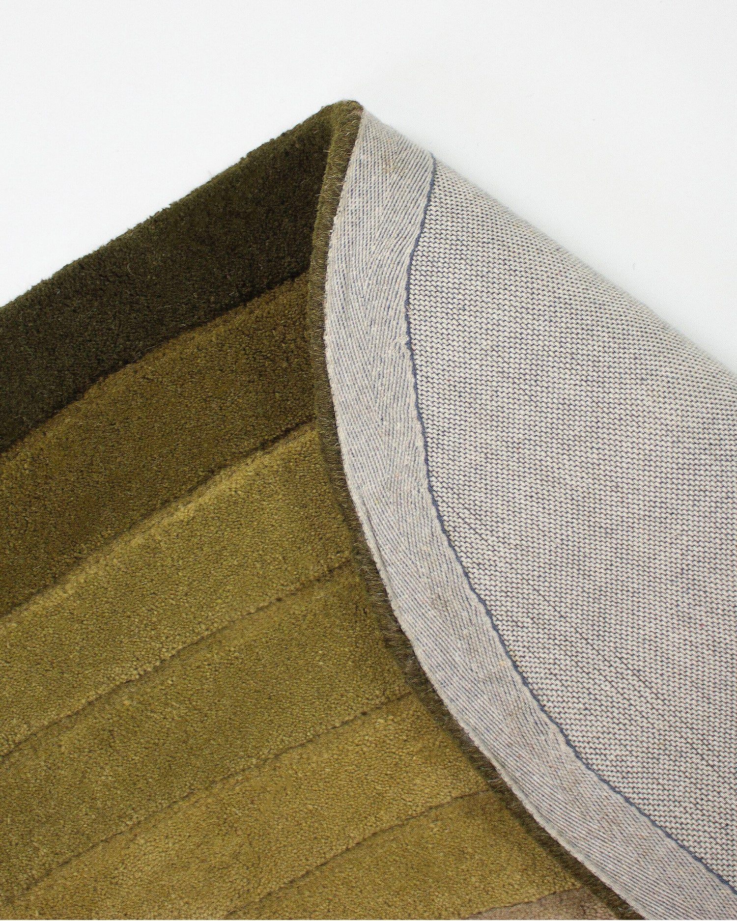 Tappeto ovale in lana Puddle