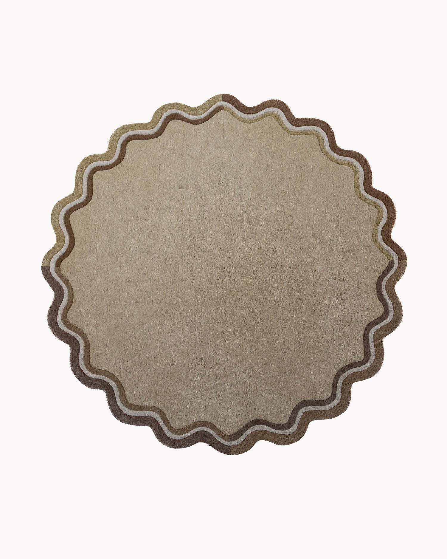 Tappeto rotondo in lana con bordo smerlato Leo