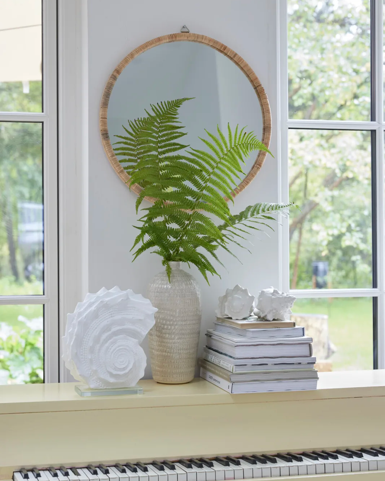 Specchio rotondo con cornice in rattan Riselle